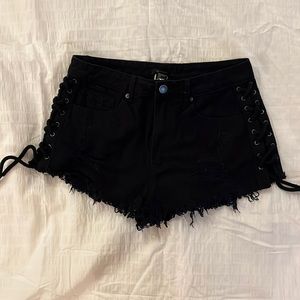 Black ripped jean shorts